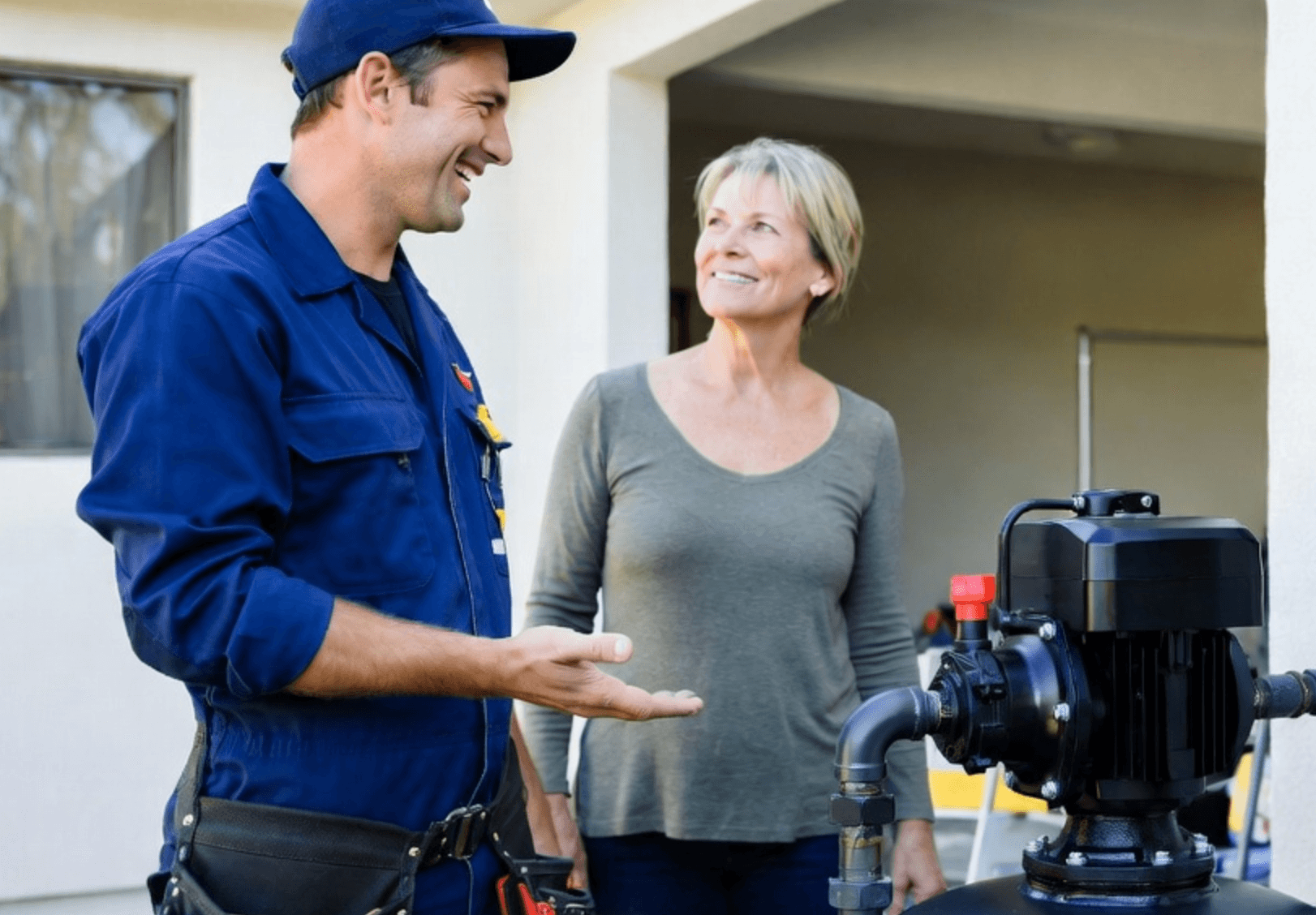 Pump installer on-site with a customer — the professionals we design for